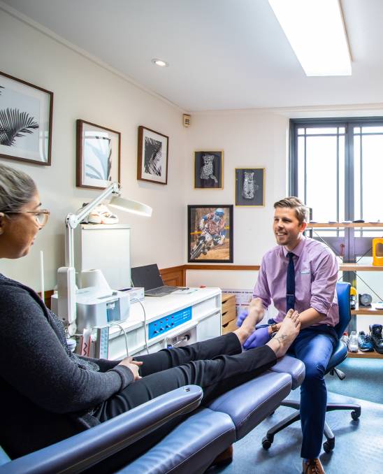 Stepping up: Podiatrist Ricky Lee ensures his patients are looking after their feet and maintaining good foot health practices.