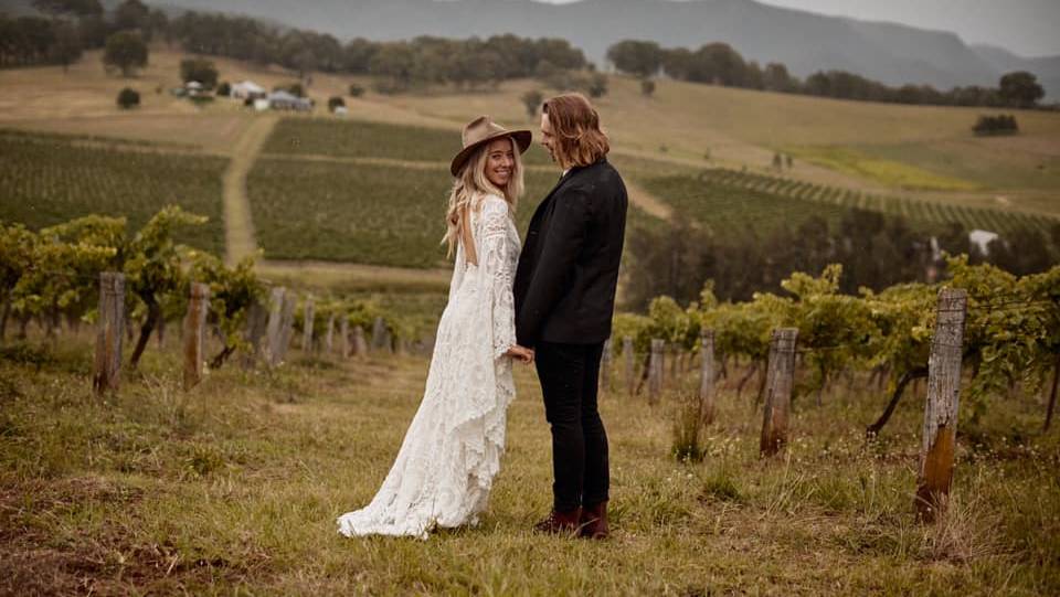 Caption: Hannah and Angus Vinden on their wedding day at Somerset Vineyard. Picture: Stefan Wellsmore